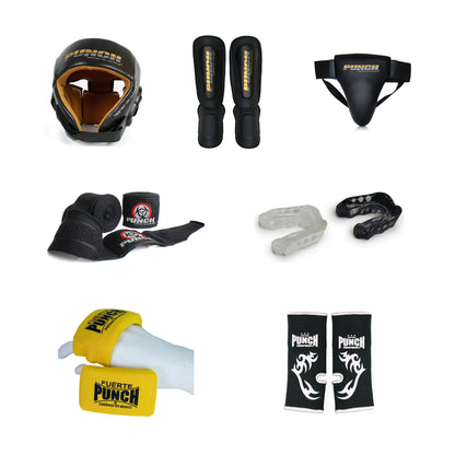 All seven pieces of the Punch Muay Thai Sparring Kit on a white background — Urban open-face head gear, Urban Muay Thai shin pads, Urban groin guard, Urban stretch hand wraps, a two-pack of Mil-Spec gel mouthguards one clear and one black, Mexican gel knuckle protectors and Thai-style ankle supports
