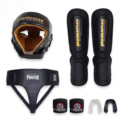 Punch Equipment women's Muay Thai sparring kit flat lay on white — Urban open-face head gear with tan suede lining, pair of Urban Muay Thai shin pads, Mexican Fuerte ladies groin guard, two stretch hand wraps and two gel mouthguards
